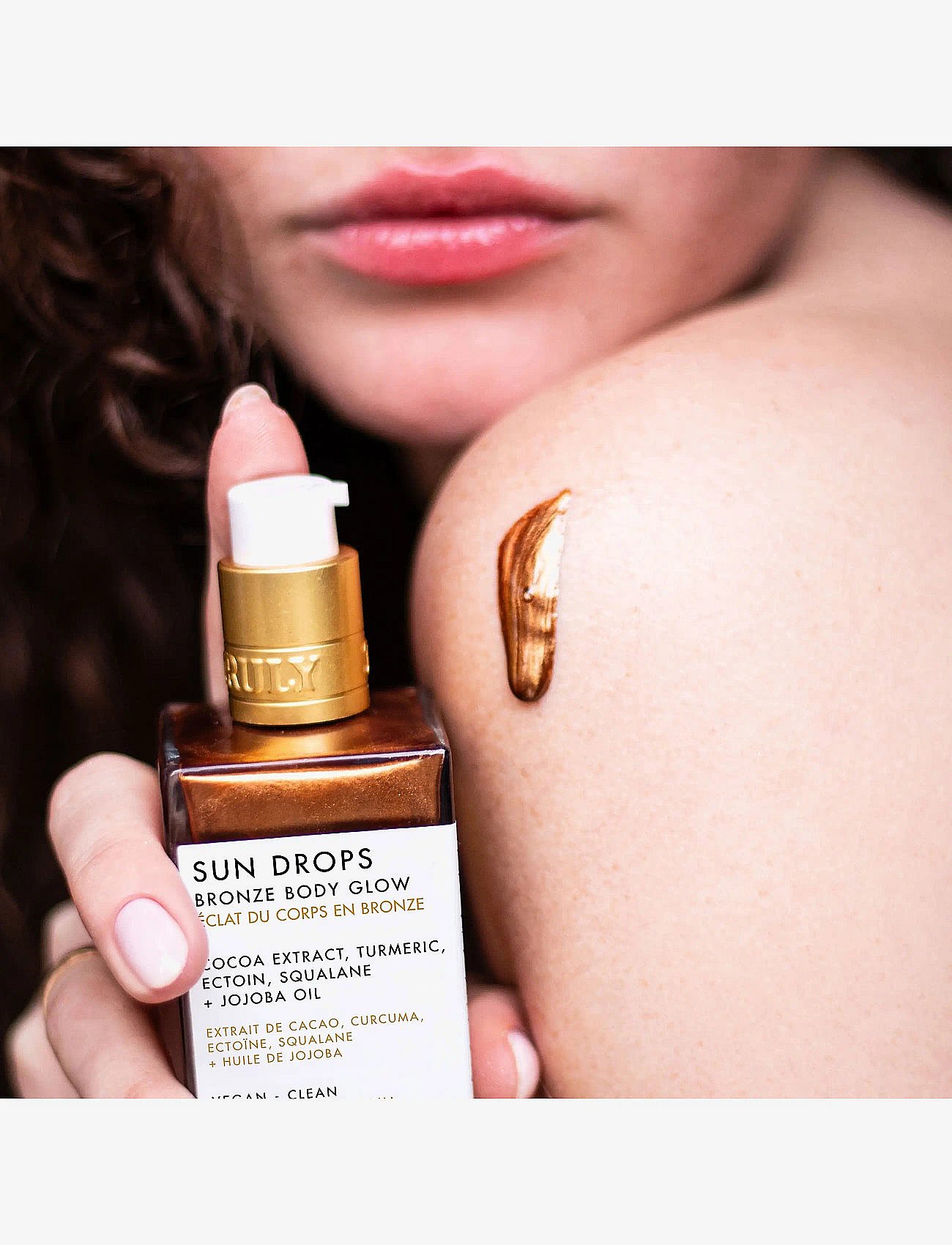 Truly Sun Drops shimmer oil med bronzing-effekt för kropp 90 ml